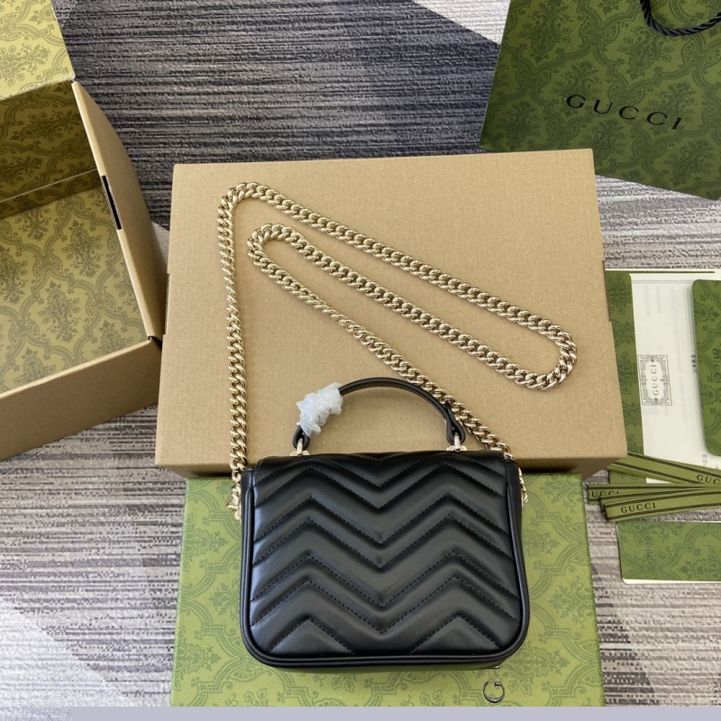 G*u*i top handle bags